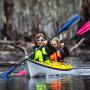 2 young girls kayaking 