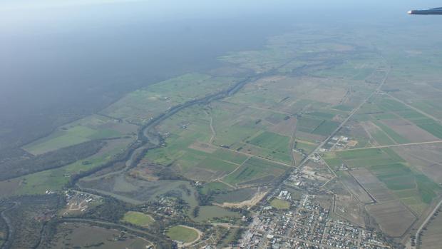 Aerial shot of Gunbower Creek meandering away in the distance, with the township of Cohuna in the foreground