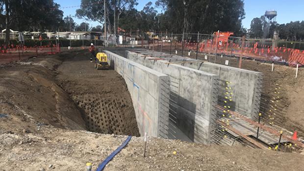 Construction of a fishway next to Gunbower Creek. Vertical concrete slots